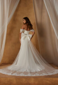 Natine by Madi Lane Modern lace and crepe fitted Wedding Dress at Love it at Stella's Bridal Shop in Westminster Maryland